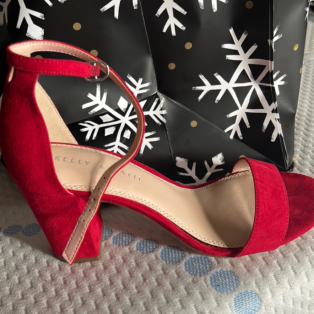Red ankle strap heels. Kelly and Katie